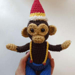 crochet monkey with pants and party hat