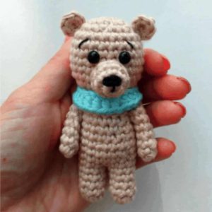 little brown bear crochet in hand