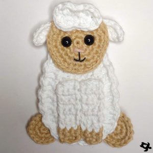 picture of a white crochet sheep applique