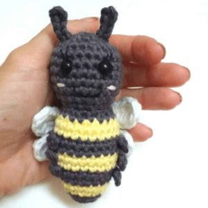 crochet bee in a hand