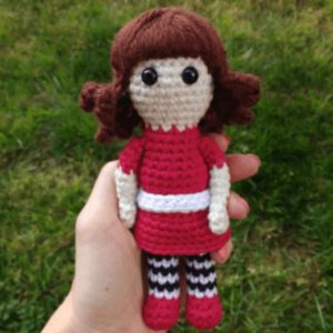 crochet doll with a red dress